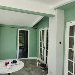 Conservatory redecoration after storm-damaged roof repair